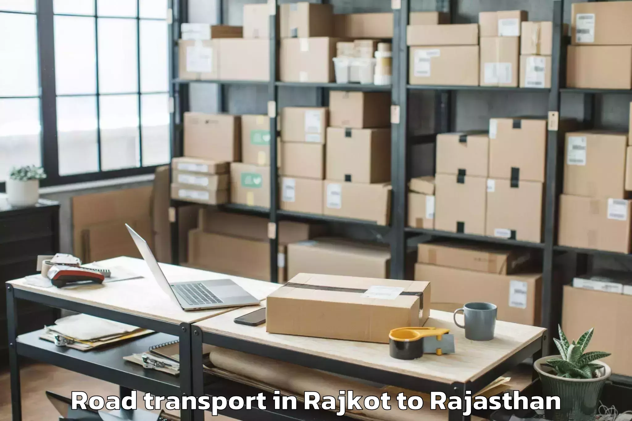 Professional Rajkot to Dholpur Road Transport